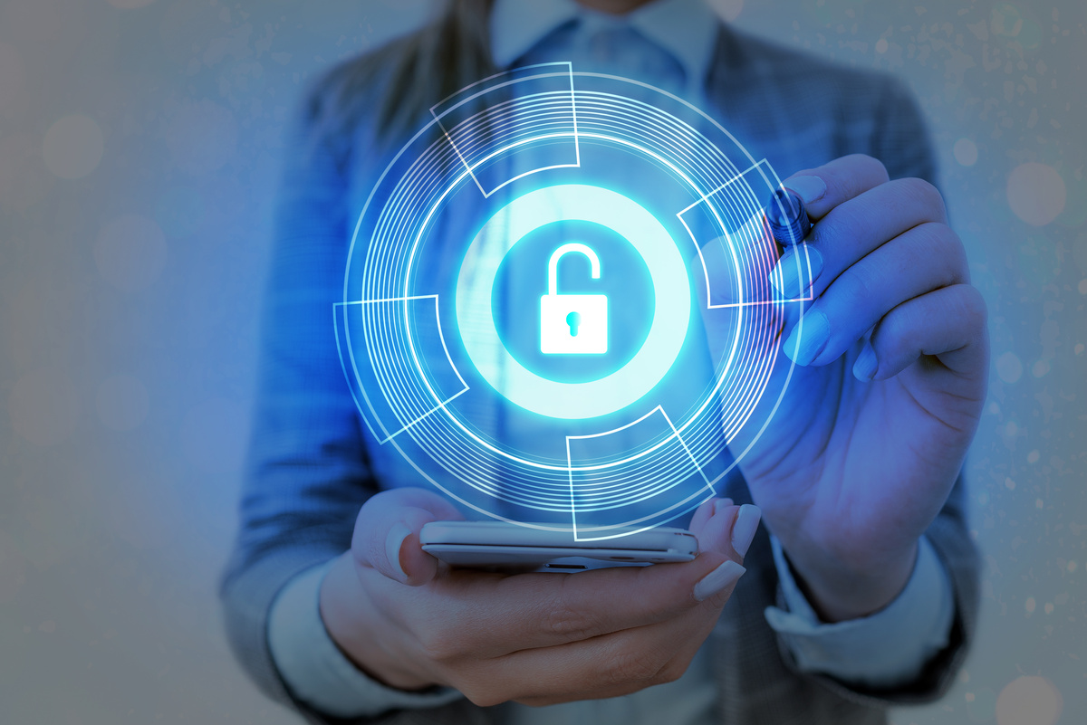 Graphics of Latest Digital Technology Protection Data Padlock Security on the Virtual Display. Businessman with Lock to Secure.